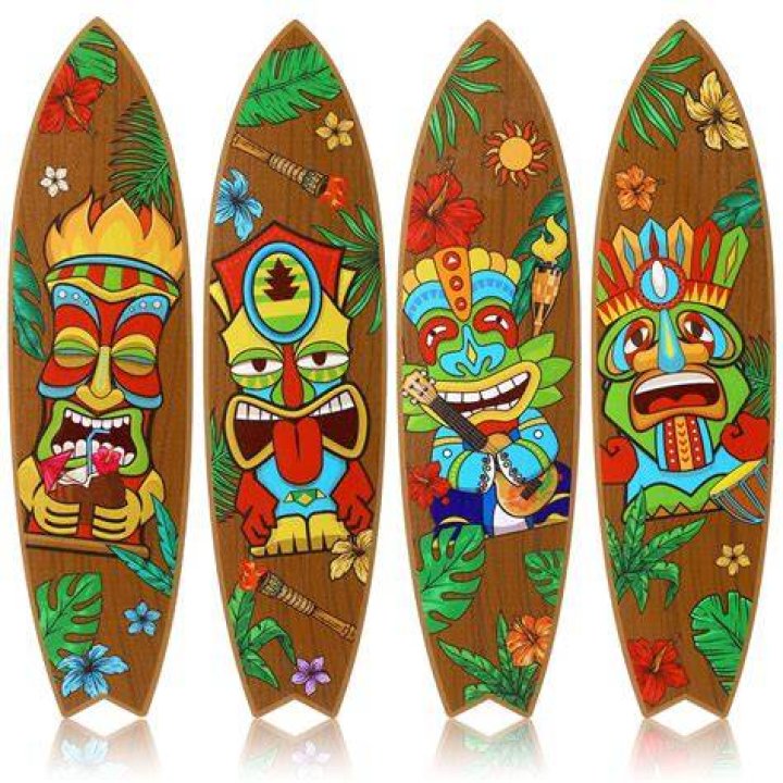 Who wrote surfing's first surf book Hawaiian surfboard?
