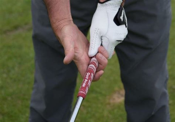 Why am I wearing a hole in my golf glove?