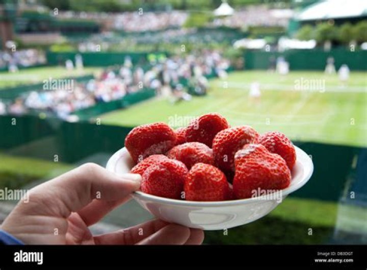 Why are strawberries associated with Wimbledon?