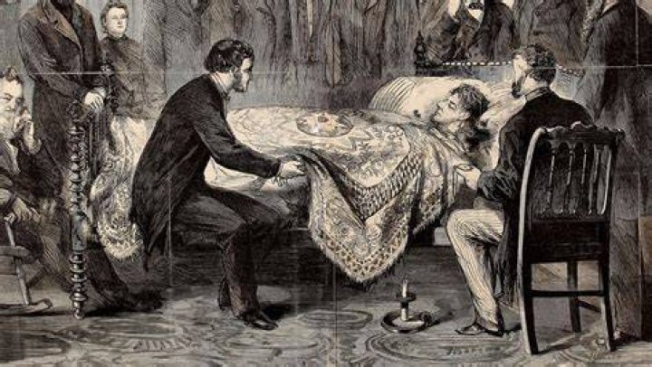 Why did Abraham Lincoln not attend his father's funeral?
