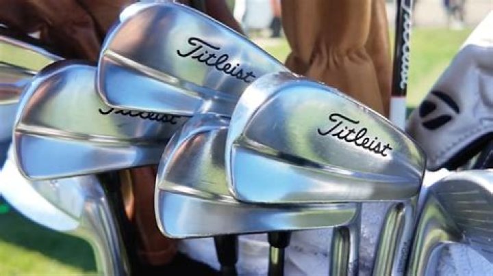 Why did Adam Scott leave Titleist?