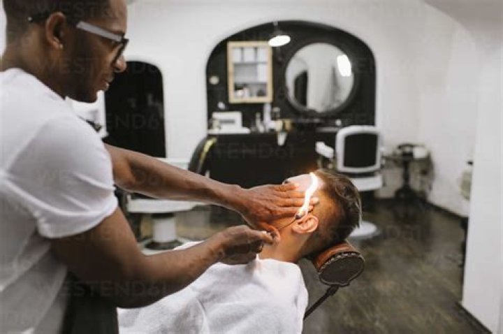 Why do barbers use fire in ears?