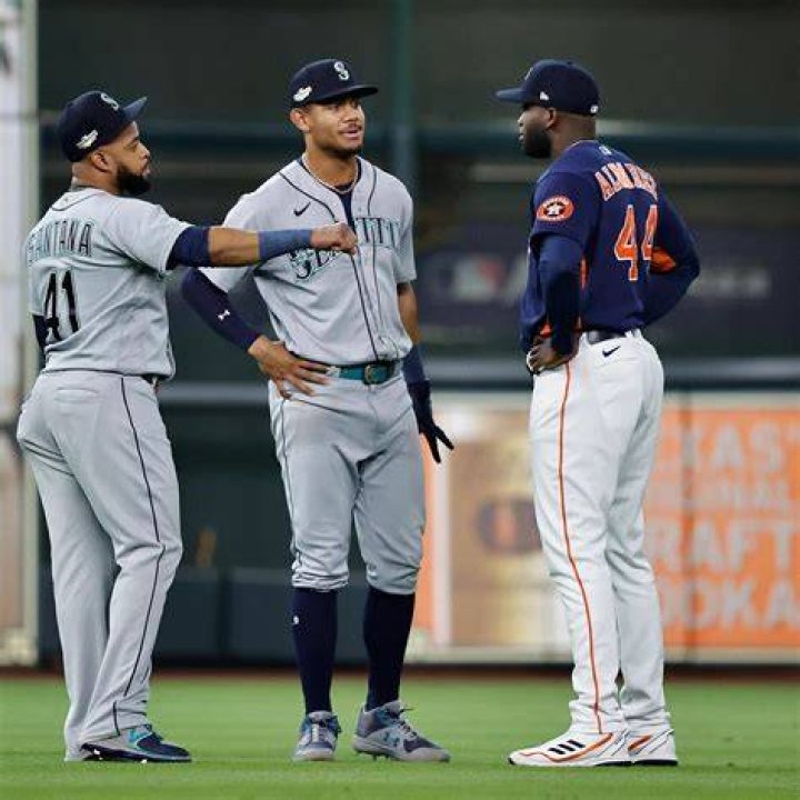 Why do baseball players tuck their pants under their cleats?