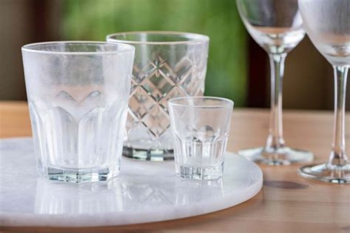 Why do crystal glasses go cloudy in dishwasher?