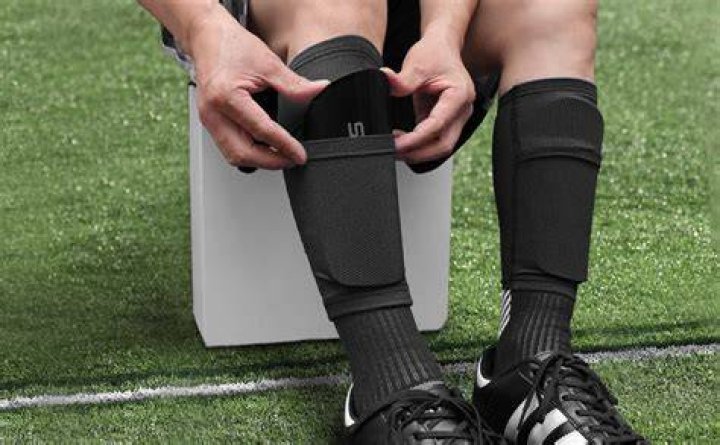 Why do footballers wear Shinpads?