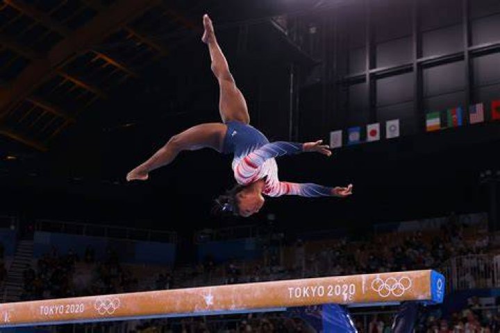 Why do gymnasts mark the balance beam?