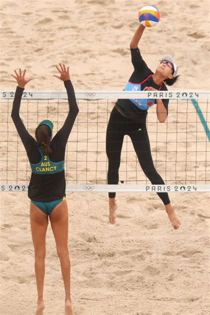 Why do they always hug in beach volleyball?