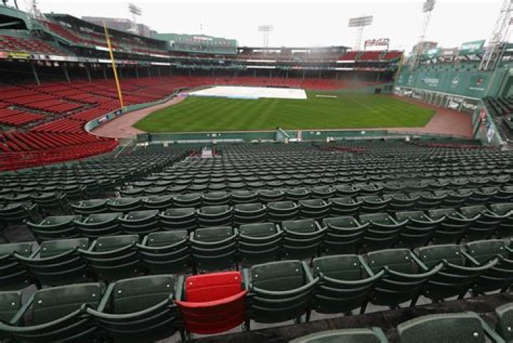 Why does Fenway Park have one red seat?