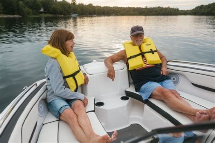 Why does the cox wear a life jacket?