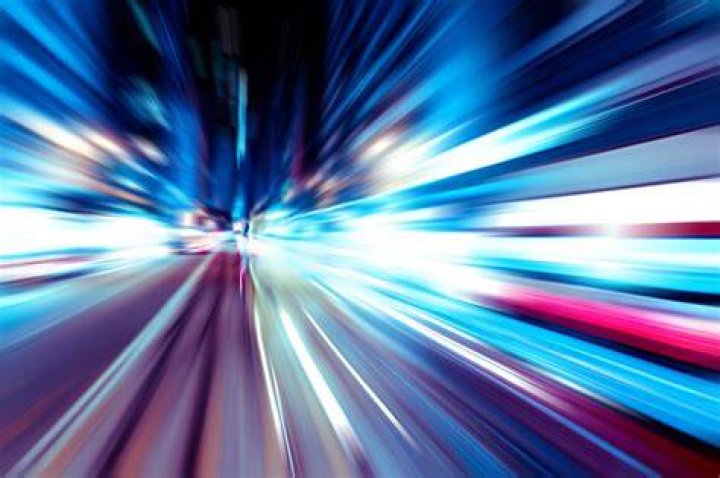 Would we age if we traveled at the speed of light?